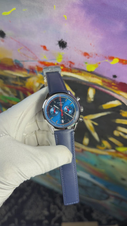 Silver with blue dial