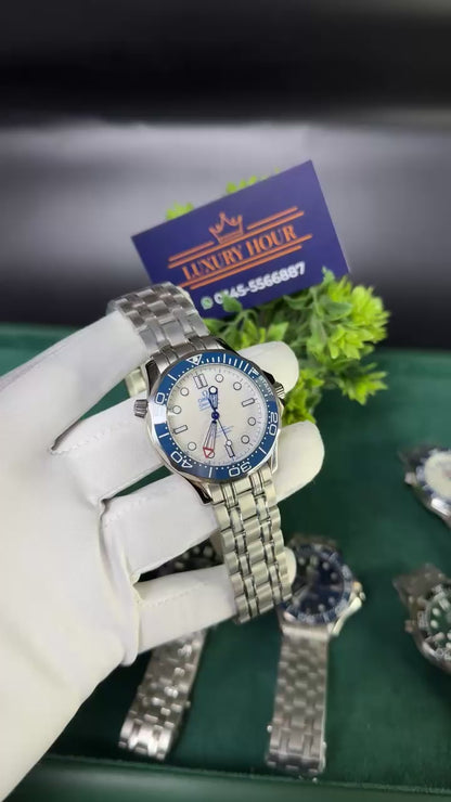 Silver with white dial and blue bezel