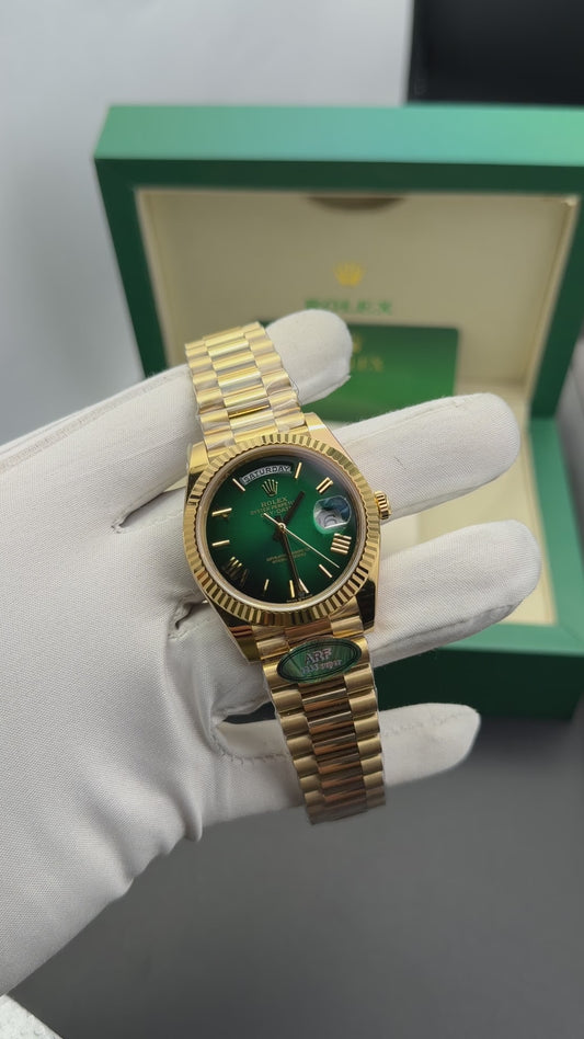 Yellow Gold with green dial