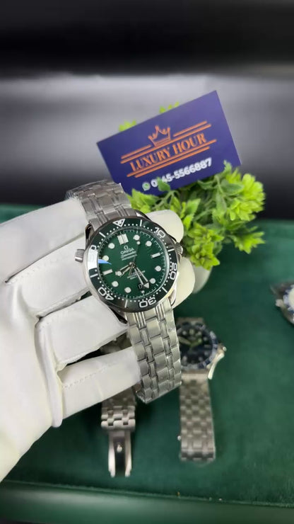 Silver with green dial