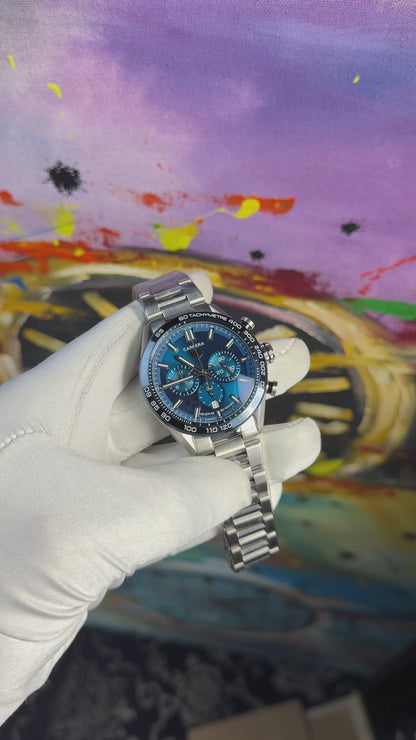 Silver with blue dial