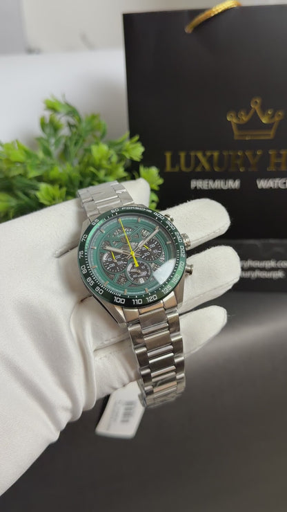 Silver with Green Dial.