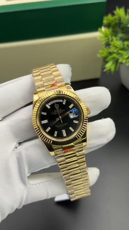 Yellow gold with black dial