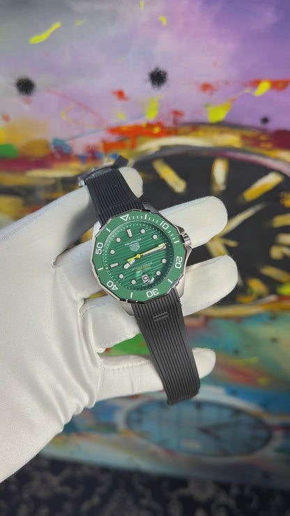 Silver with green dial