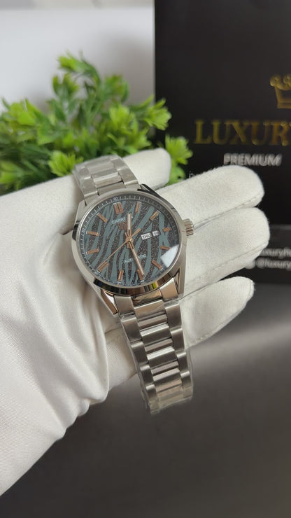 Silver with Tiger Dial.