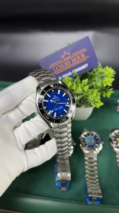 Silver with blue dial