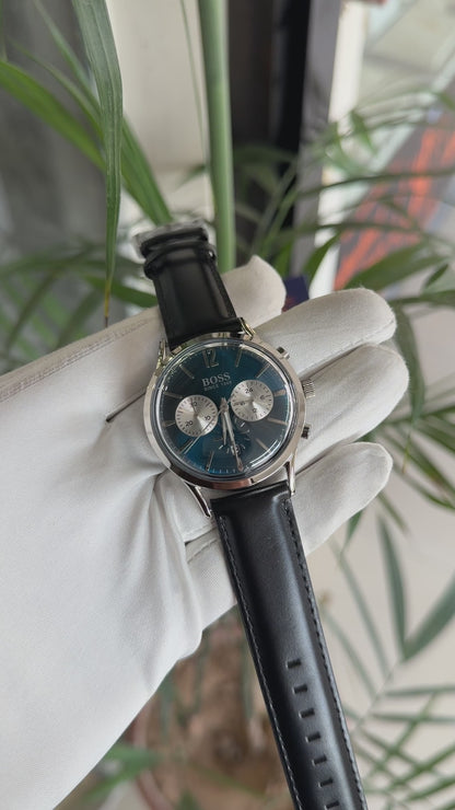 Silver with blue dial and black strap