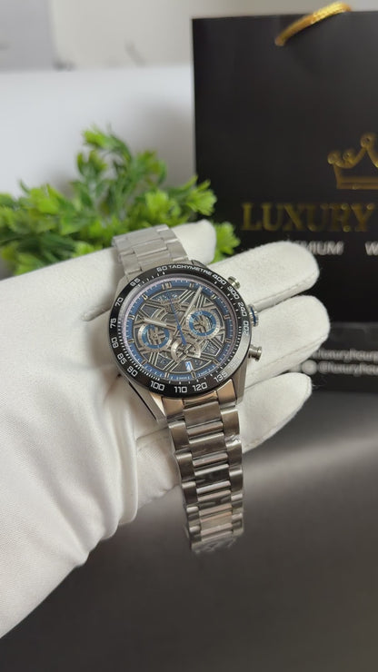 Silver with Blue Dial.