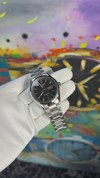 Silver with black dial