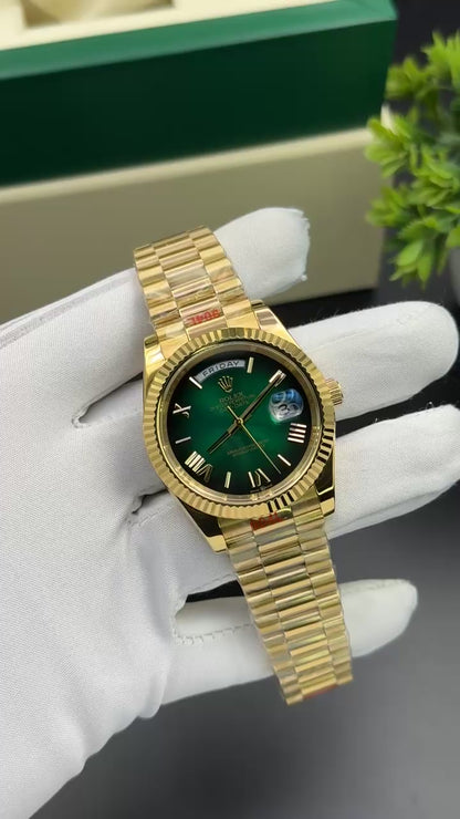 Yellow gold with green dial